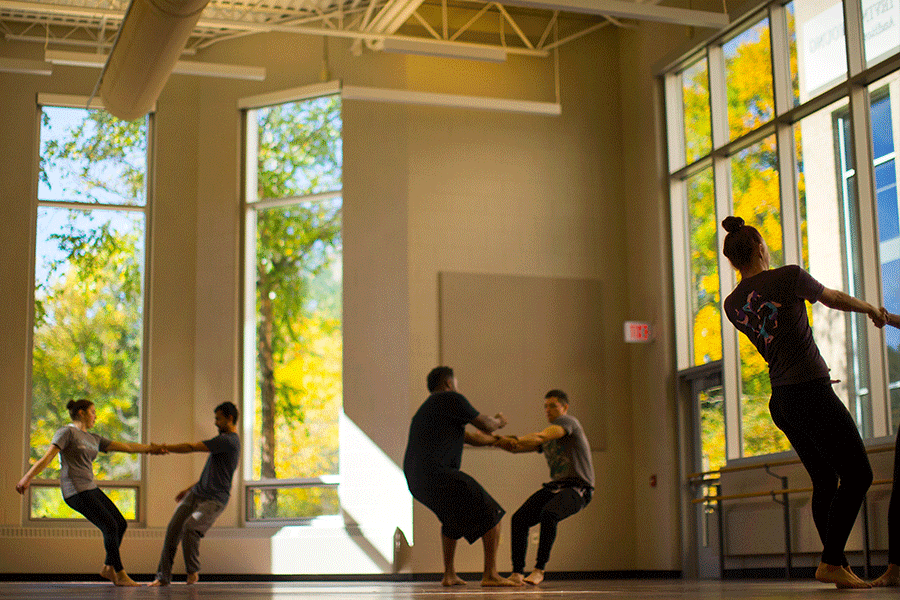 Learning the art of partner work in the dance studio on the University of Wisconsin Whitewater campus.