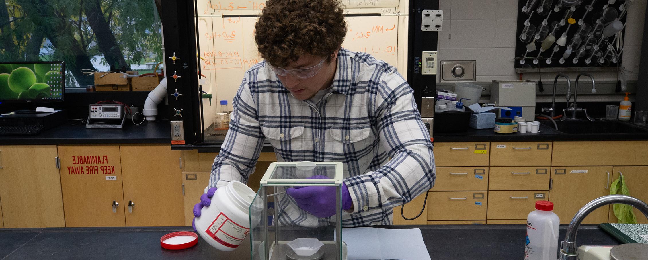 A student works in the chemistry lab.