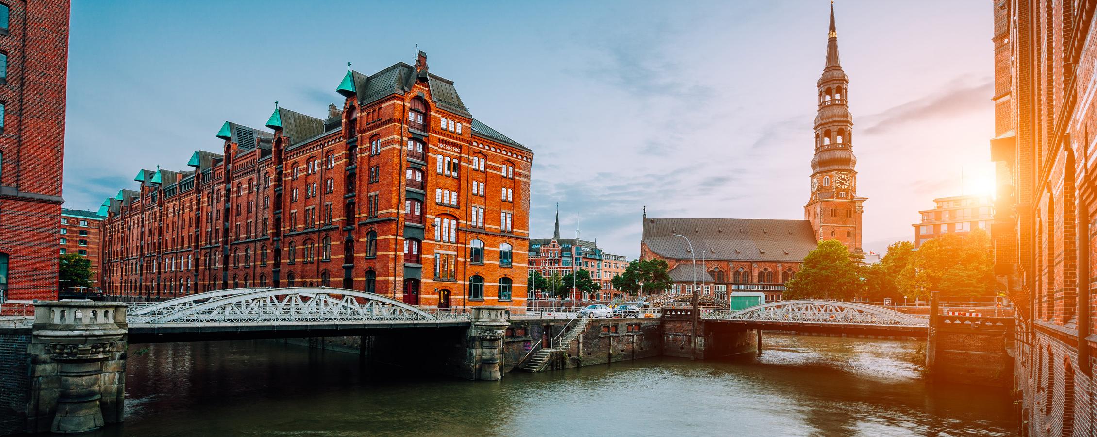 View of a German city with sun rising over the horizon