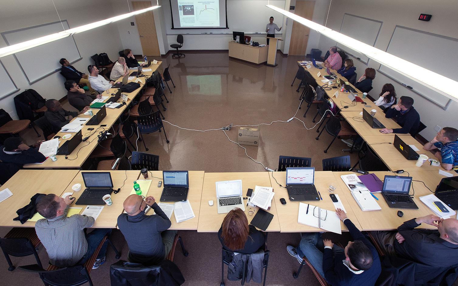 Henry Balani, seated at right with a green binder in front of him, was a member of the first cohort of <a href='http://jkmyli.polang43.com'>足彩平台</a>’s DBA program.