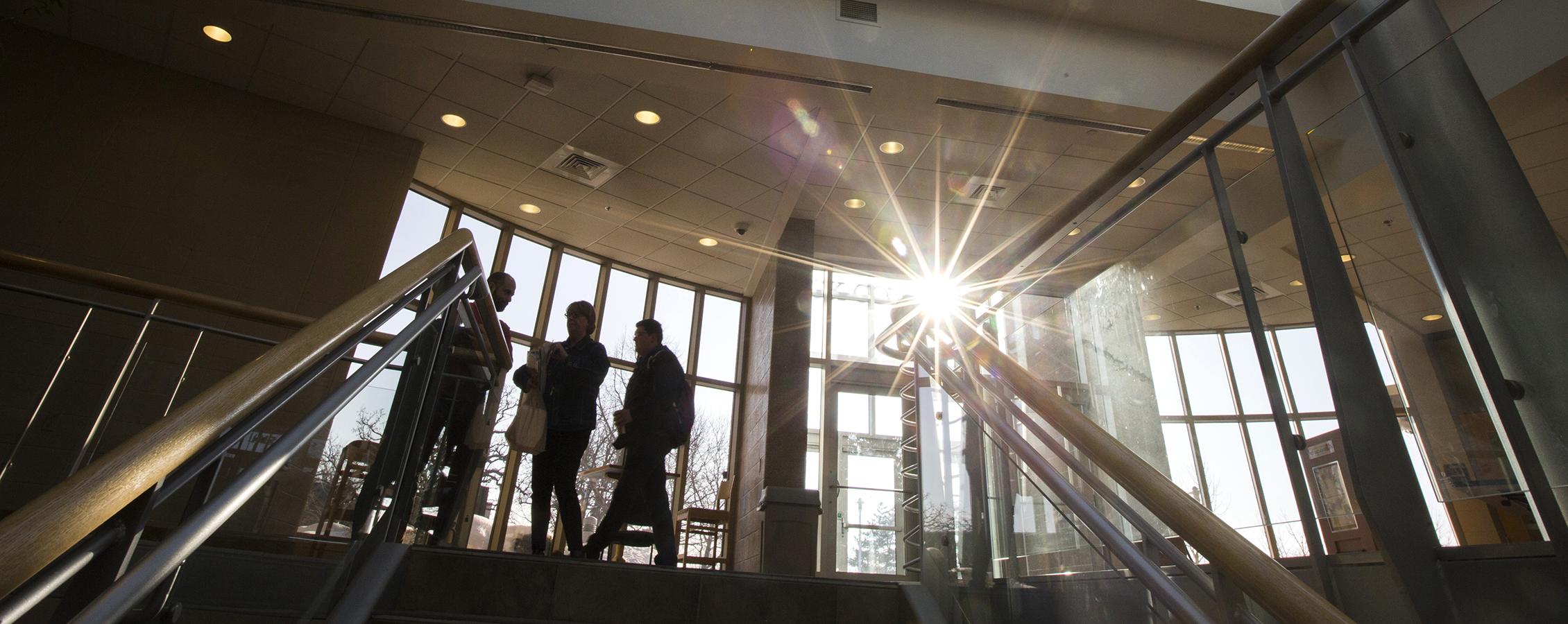 Entryway with the sun shining through the windows.